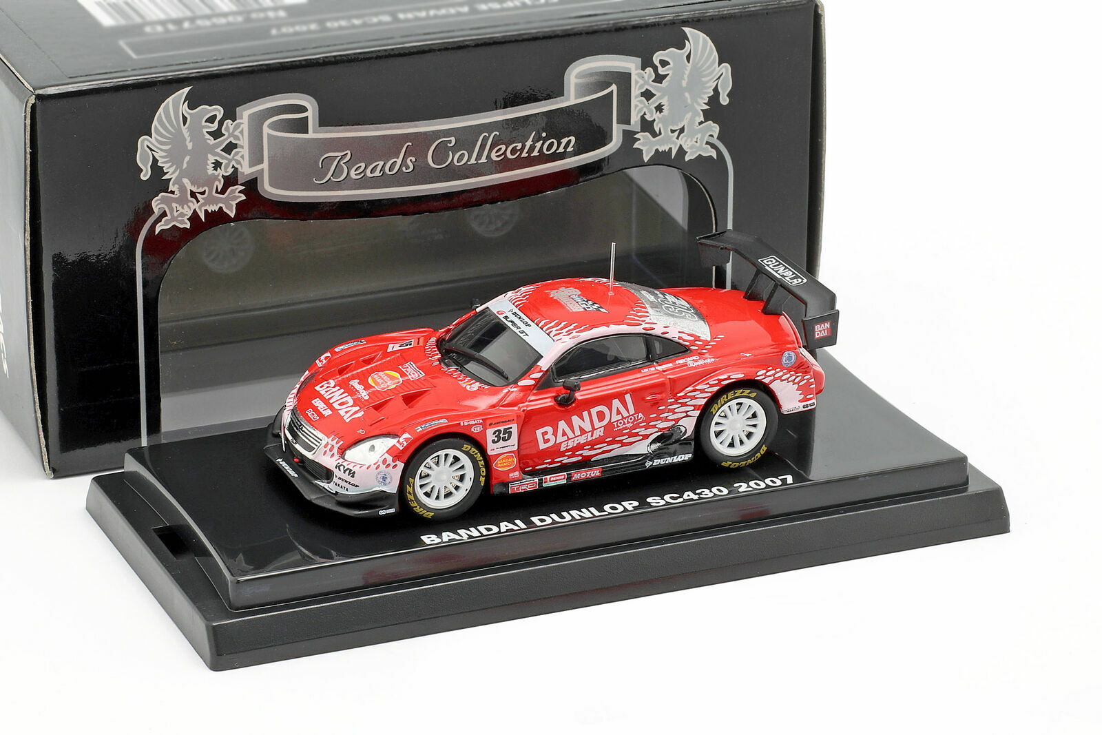 1:64 LEXUS Bandai Dunlop SC430 (2007), белый с красным - 06571E