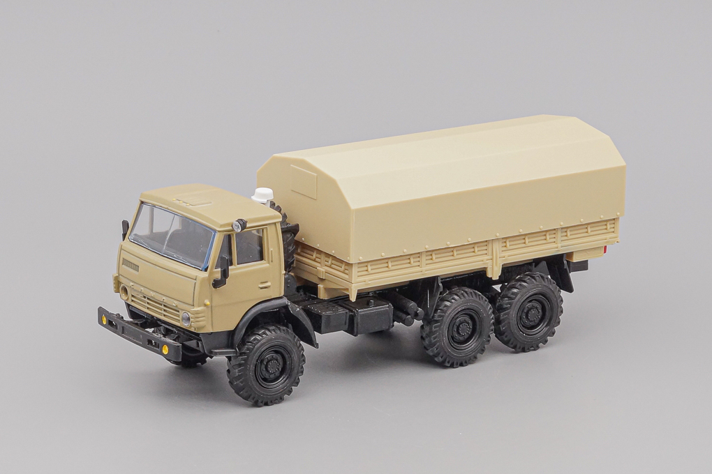 1:43 (Б/У) КАМАЗ 4310 бортовой с тентом, песочный - ELK-1003-X1