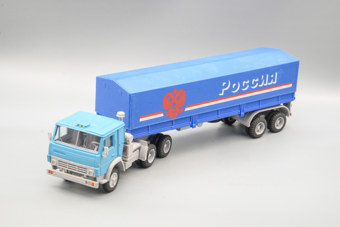 1:43 КАМАЗ 5410 Россия, с полуприцепом ОДАЗ-9370 с тентом 'Россия' (рама серая, герб красный), синий/голубой - ELK-1132