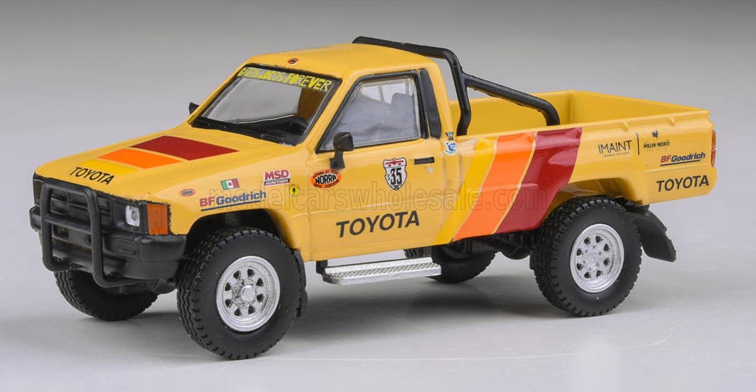 1:64 TOYOTA HILUX pick-up team norra 1000 LHD (2023), yellow / orange - PA-55530