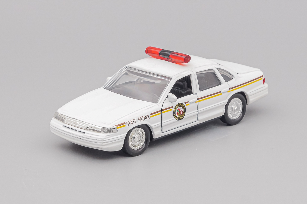 1:43 FORD Crown Victoria North Dakota Police, white - LOT01422