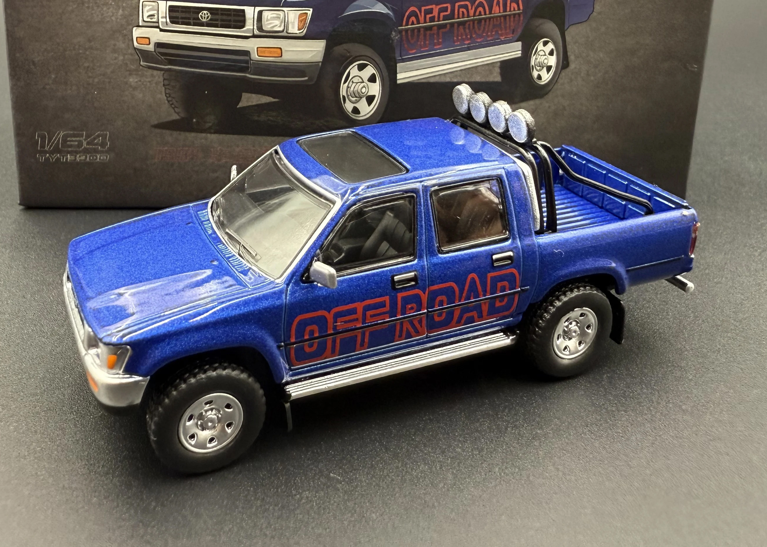 1:64 TOYOTA Hilux Double Cab 4WD (LN101) 'Off Road', blue - TYT3900