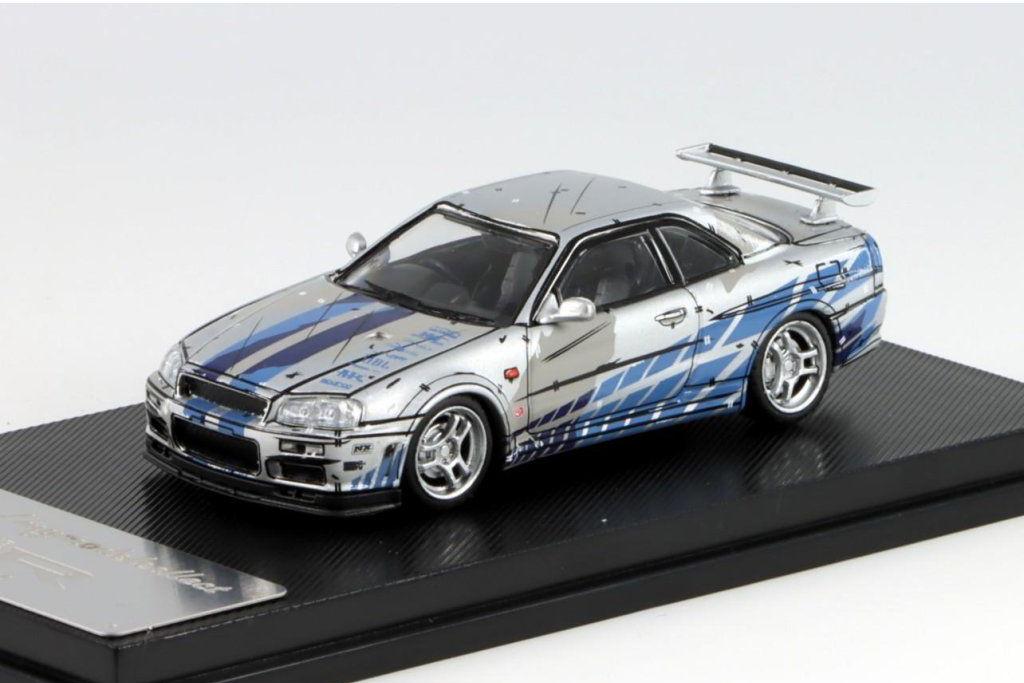 1:64 NISSAN Skyline GT-R R34 V-Spec, silver/blue - MC640009I