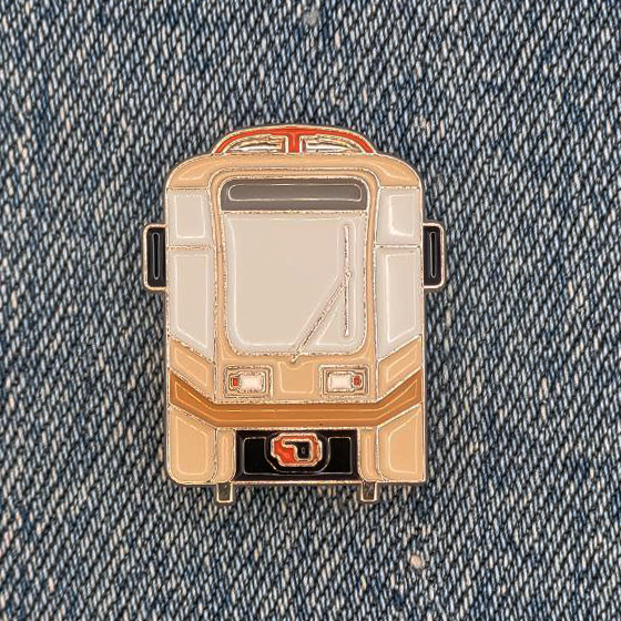 Значок 'КТМ-19', бежевый - TAG057