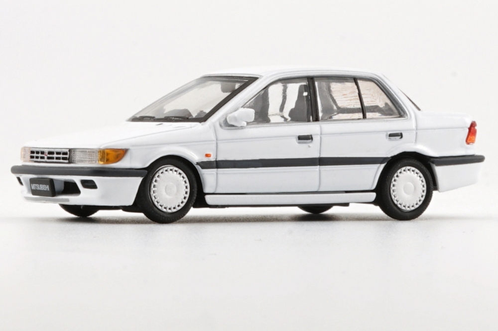1:64 MITSUBISHI Lancer GTi (1988), white left hand drive - BM64B0175lhd