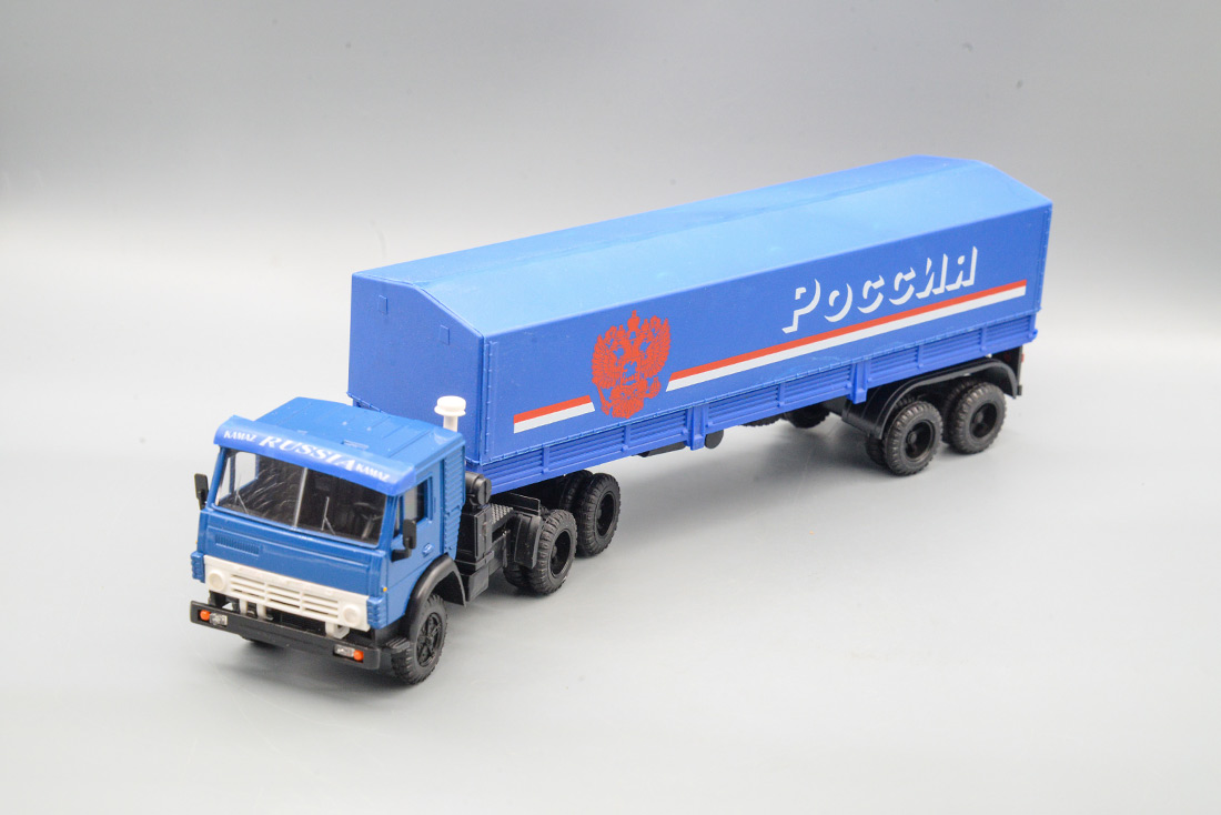 1:43 КАМАЗ 5410 (синий визор с надписью Россия) с полуприцепом ОДАЗ-9370 с тентом 'Россия', синий - ELK-1128