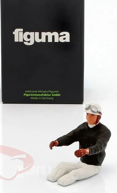 1:18 Фигурка сидящего гонщика в черном свитере - AE180178