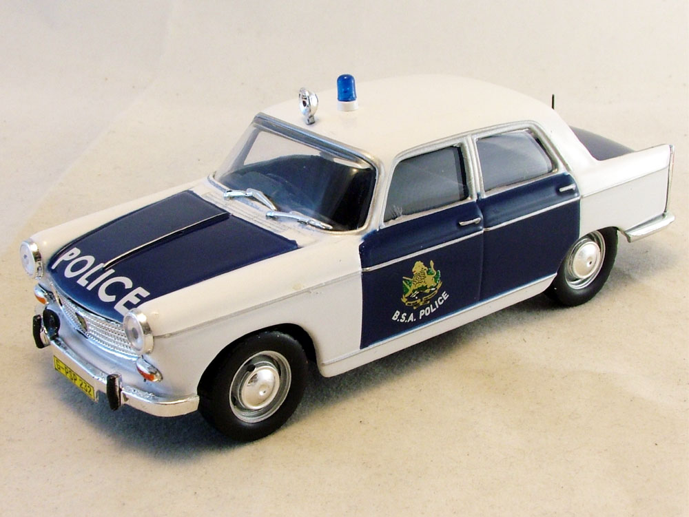1:43 PEUGEOT 404 Британская полиция Южной Африки, Полицейские Машины Мира 47, белый с синим - PCW047
