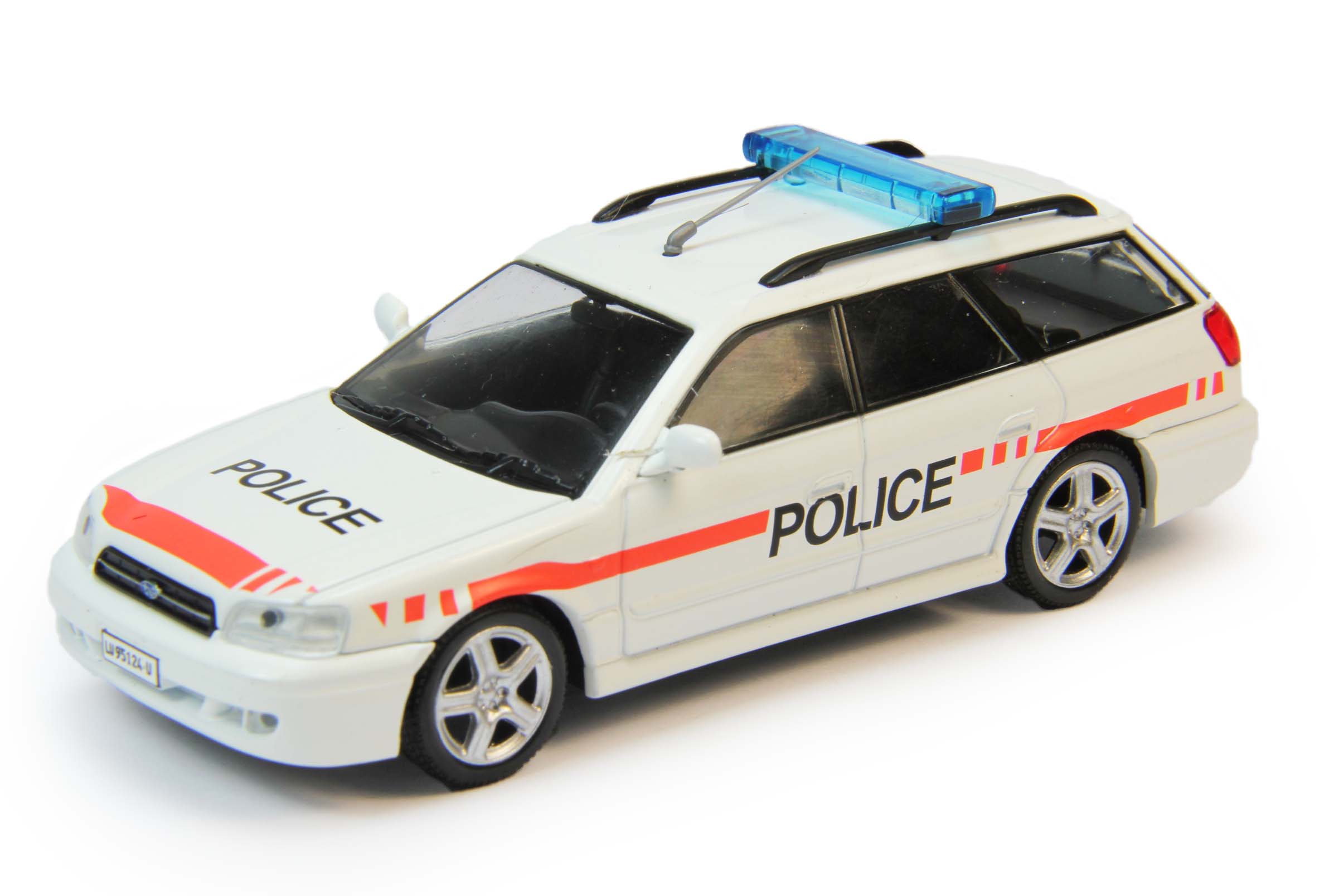 1:43 SUBARU Legacy Полиция Швейцарии, Полицейские Машины Мира 58, белый - PCW058