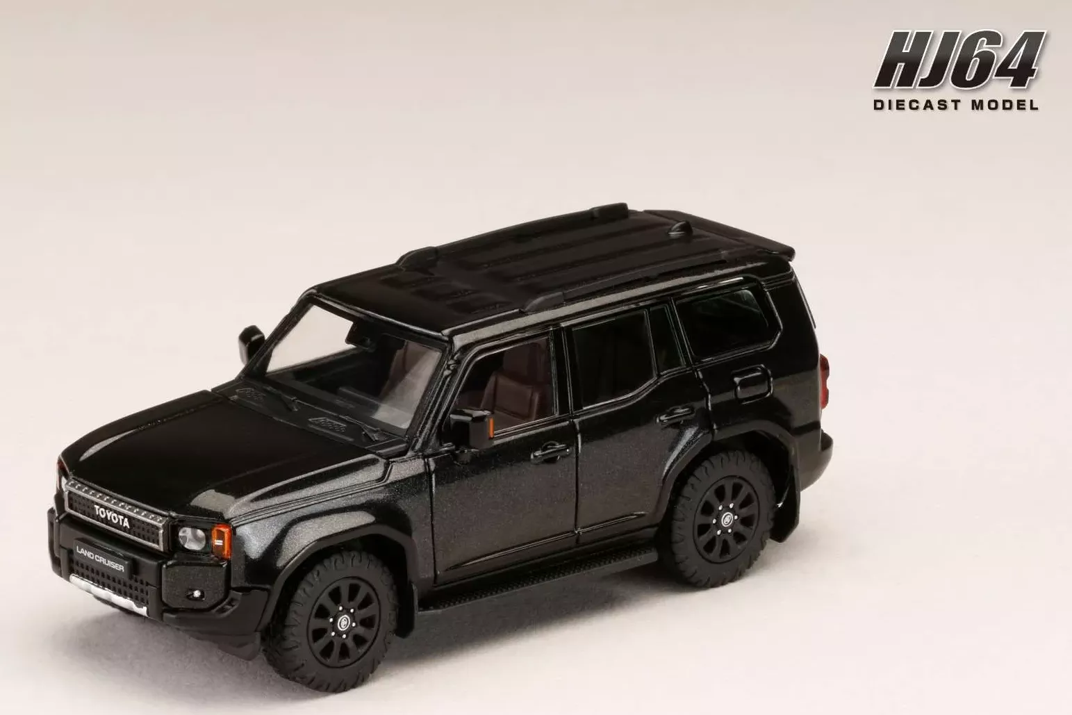 1:64 TOYOTA Land Cruiser First Edition Lhd (2024), black - HJ645081BK
