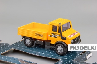 1:50 MERCEDES-BENZ Unimog, бортовой, оранжевый - crc329